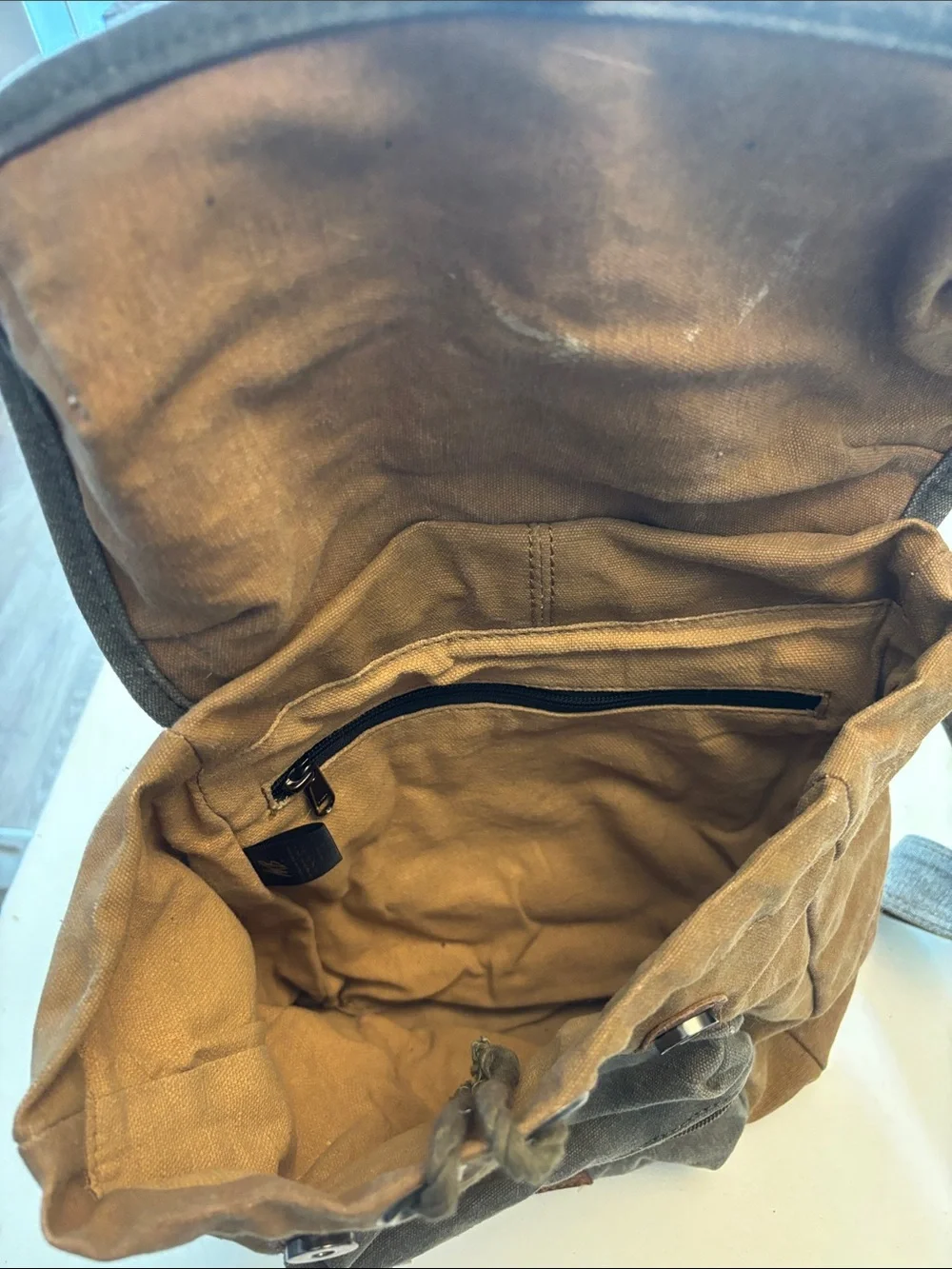 Canvas Sling Backpack with Leather Accents